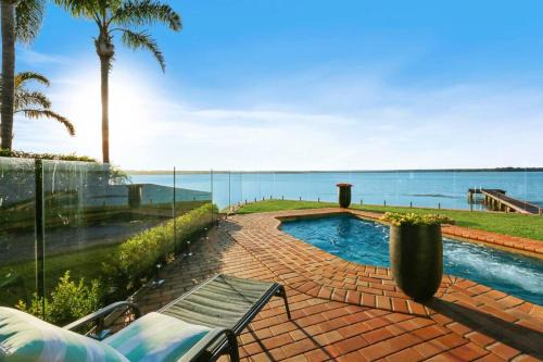 Toukley House | Tranquil 5 Bedroom Villa with Private Pool & Beach Access