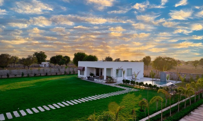 Jaipur District Villa | Relaxing Retreat with Lush Gardens and Poolside Bliss