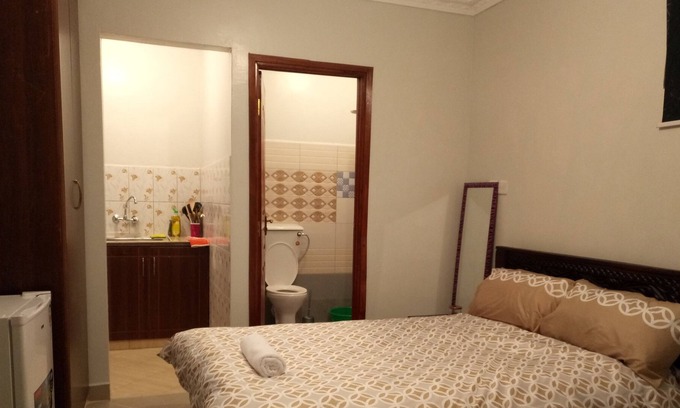 Gigiri House | Serene Green Guest Room