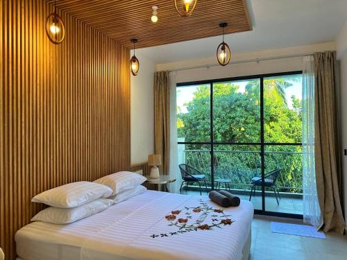 Thoddoo House | Inviting Serene Sky Guest House with Private Beach Access
