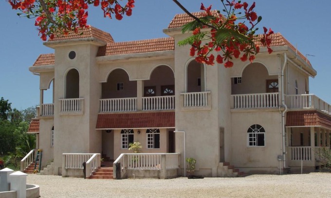 Corozal Bed & Breakfast | Seaside Serenity Sands: Rated 9.3 with Private Beach Access