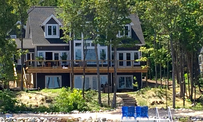 Suttons Bay House | Tranquil Escape: Ocean View Rooms & Spa Retreat Awaits!