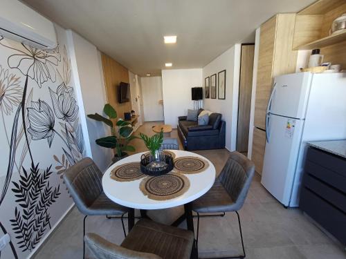 Cordoba Apartment | Inviting SERIETÁ: Poolside Relaxation with Ocean Views