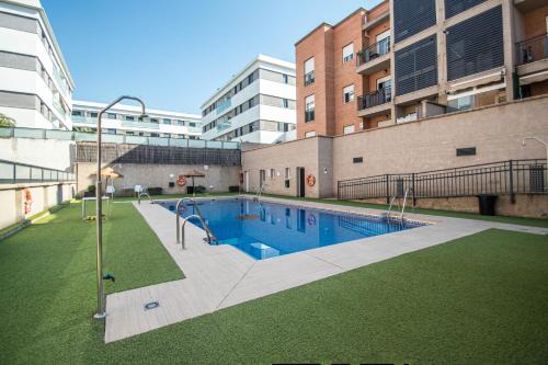 Bola de Oro Apartment | Family-Friendly Serrallo Apartment with Pool & High Ratings