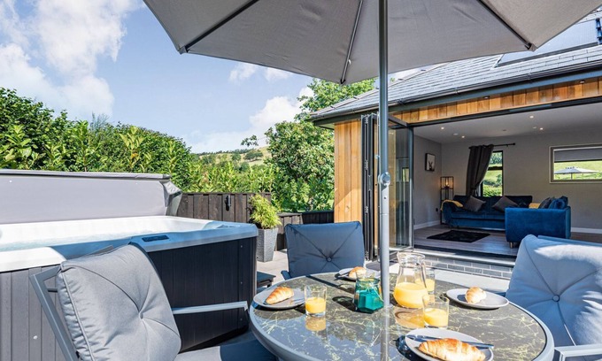 Tirabad Cottage | Cozy Lodges with Spa & Hot Tub in Serene Rural Retreat