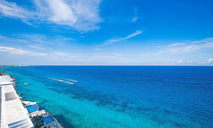 San Miguel Condo | Oceanfront Retreat at Seven Shades of Blue Peninsula Grand