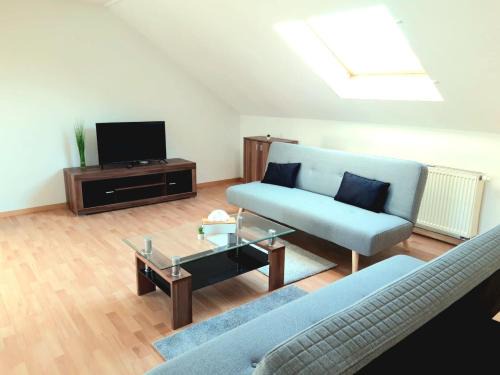 Grossrohrsdorf Apartment | Seyfarthrooms - Großröhrsdorf 2 - zentrale Lage, stilvolle Einrichtung, Blick in den Garten