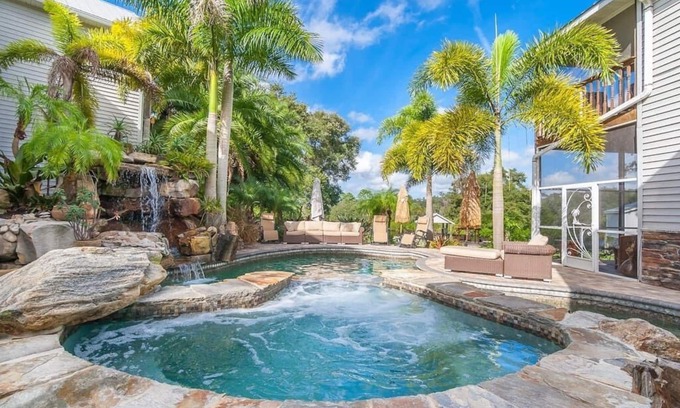 Braden River House | Shangri-La Private Waterfront Resort with Mega Pool & Spa