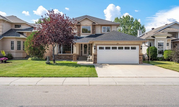 Southeast Calgary House | Experience Perfection: 4BD Pet Friendly on Golf Course