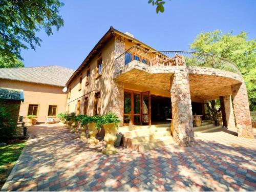 Lephalale House | Relax at Shelanti Game Reserve: Pool, Spa & Ocean Views