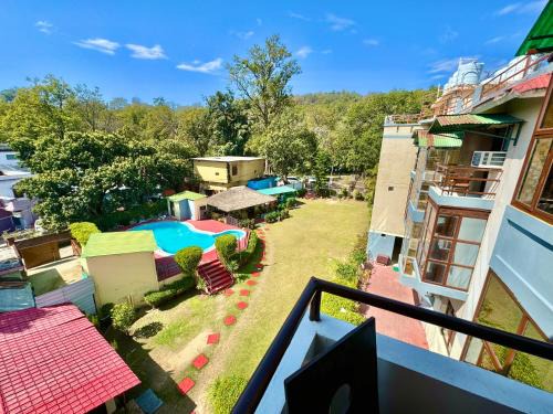 Dhikuli Hotel | Discover Comfort at Shelton Blu Resort with Pool & Restaurant