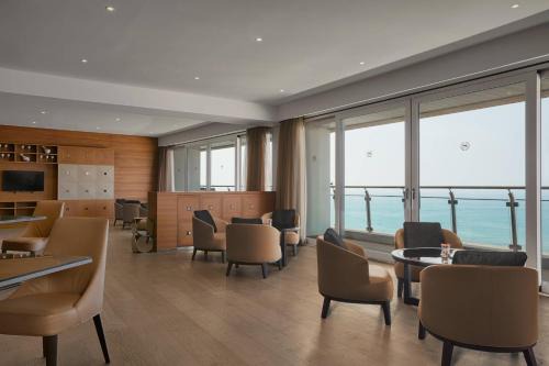 Algiers Hotel | Relax at Sheraton Club des Pins Resort with Oceanfront Views