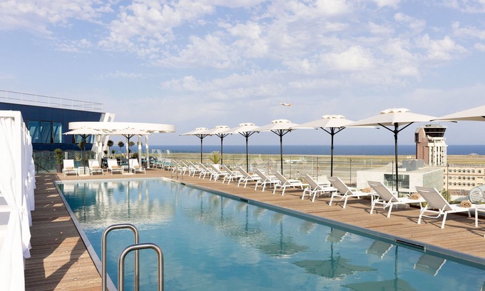 L'Arenas Hotel | Discover Sheraton Nice Airport: Eco-Friendly Comfort & Pool
