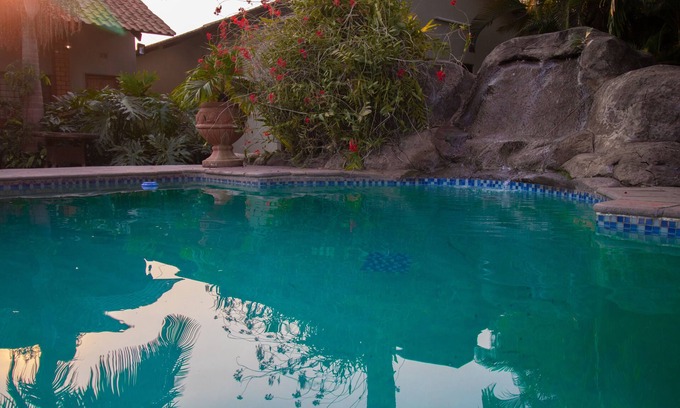 Kitwe Hotel | Relax at Sherbourne Lodge: Pool, Spa & Family-Friendly Stay