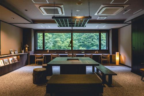 Tenninkyo Onsen Hotel | Experience Shikishimaso: Family-Friendly Getaway with Hot Tub