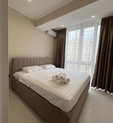 Almaty Apartment | Experience Comfort at Sholpan City: Rated 10/10 by Guests