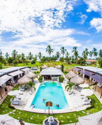 El Jobo Hotel | Discover Show Pony Beach Resort and Suites: Oceanfront Bliss