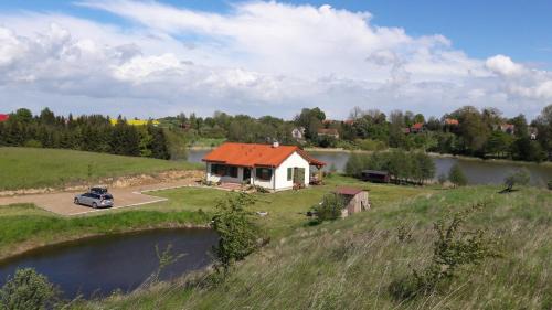 Gizycko House | Discover Siedlisko Upałty: Oceanfront Oasis with Top Ratings