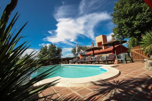 Yocsina Cabin | Discover Sierras Cabañas: Pet-Friendly Retreat with Pool