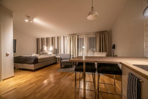 Arjeplog Apartment | Discover Simloc Hotel Drottninggatan: Family-Friendly Retreat