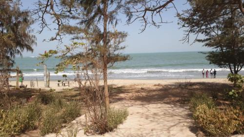 Tanji House | Cozy Retreat at Baobab Beach: Family and Pet Friendly