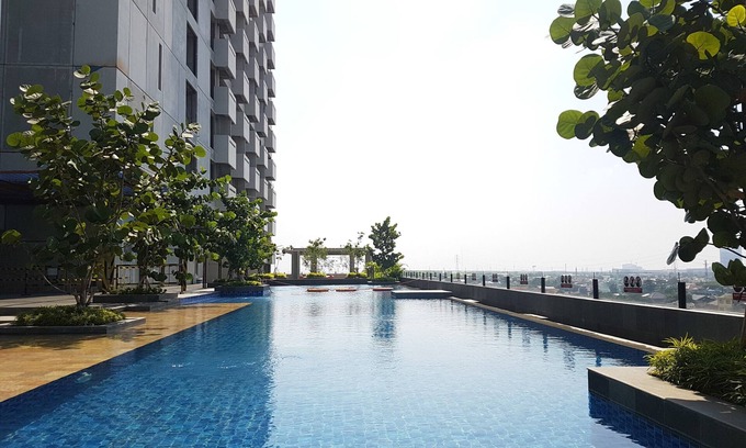 Panunggangan Utara Apartment | Cozy Studio Apartment with Pool at Tree Park City