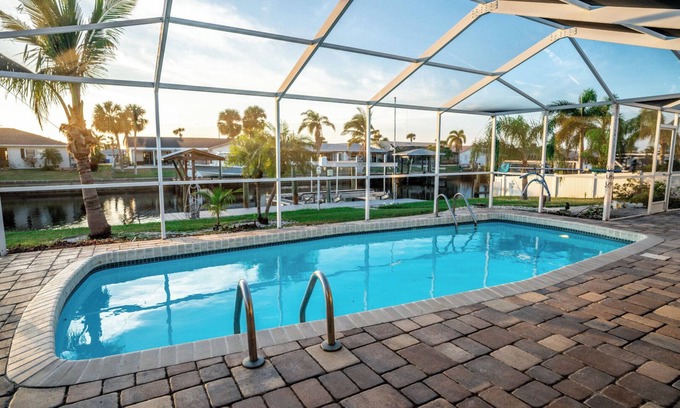 Bal Harbour House | Simply Blessed: Chic Waterfront Home w/Pool/Spa + Lanai Bar