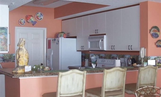 Navarre Beach Condo | Unforgettable Getaway: Book Your Ocean View Escape Now!