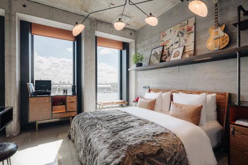 Amsterdam North Hotel | Experience Sir Adam Hotel: A 4-Star Stay with Pool & Dining