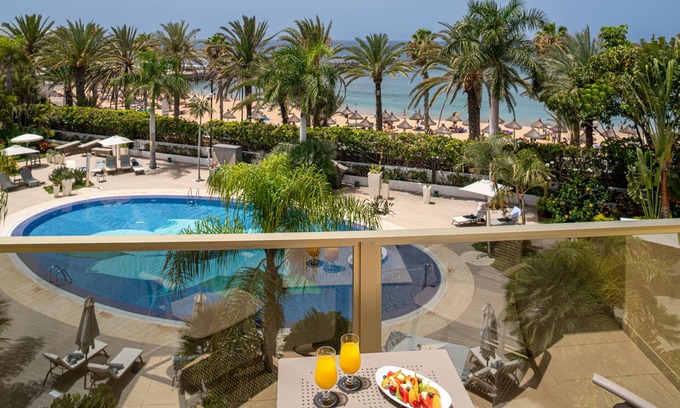 Arona Hotel | Indulge at Sir Anthony Hotel - 5-Star Retreat with Spa & Pool