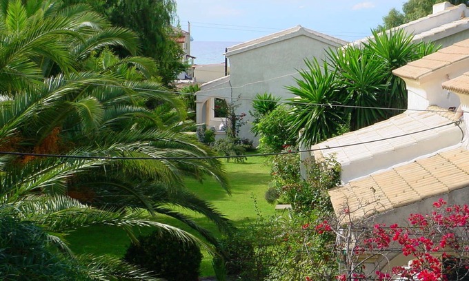 Almiros Beach House | Discover Sirios Villas: Ocean View & Kitchen Amenities