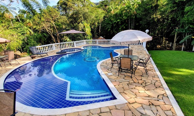 Corcovado House | Relaxing Retreat in Ubatuba with Pool and Fishing Pond