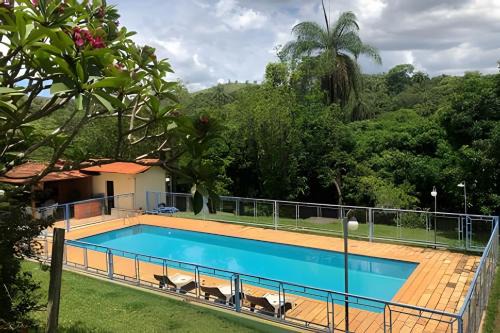 Jaboticatubas House | Inviting Retreat with Heated Pool and Family-Friendly Suites