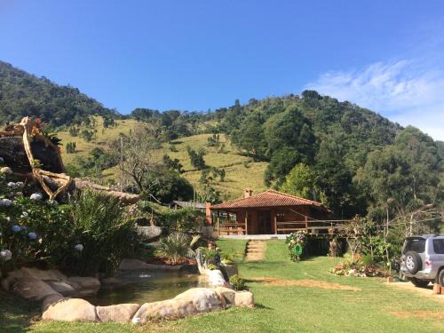 Sao Pedro da Serra House | Serene Retreat with Natural Pool and Waterfall in Lumiar