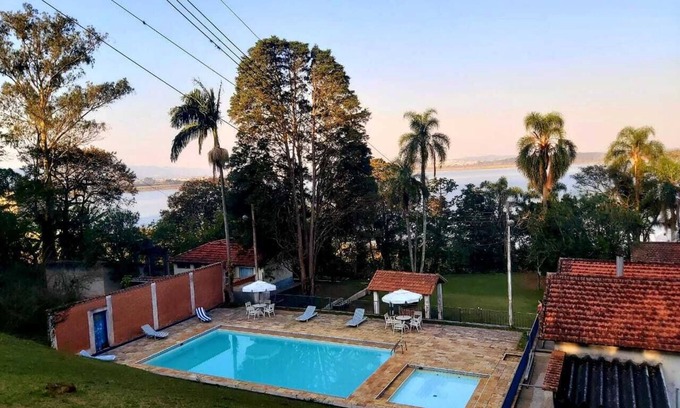 Suzano House | Relax at Sitio Primavera Suzano: Ocean View & Family-Friendly