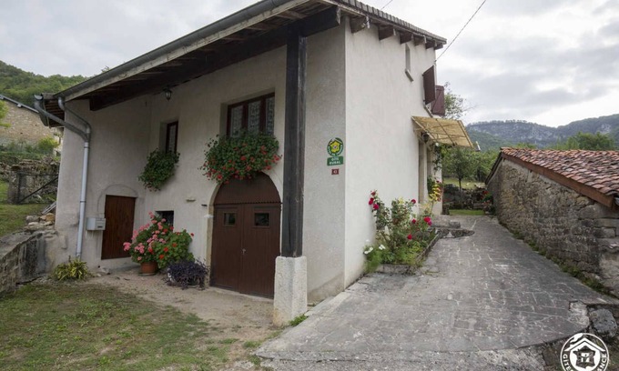 Bolozon House | Riverside Escape: Family-Friendly with Kitchen Amenities