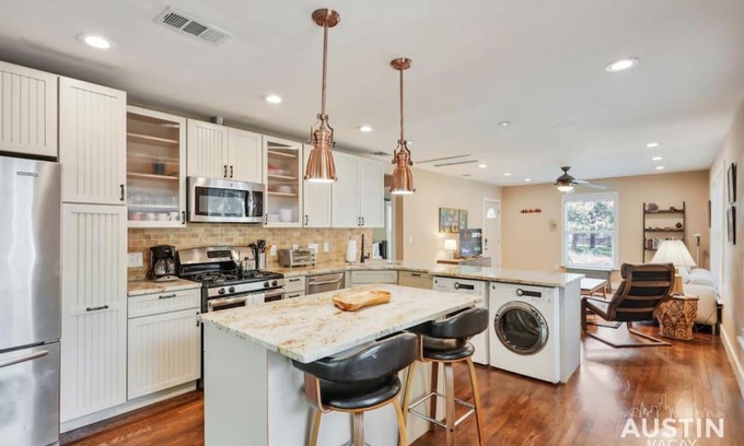 Brentwood House | Inviting Porch Retreat with Gourmet Kitchen & Family-Friendly Amenities