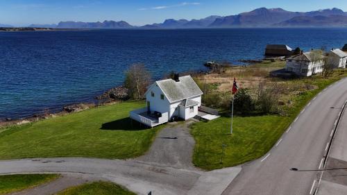 Haram House | Scenic Oceanfront Retreat with Boat Rental Available
