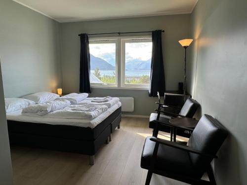 Storfjord Hotel | Cozy Skibotn Hotel: Pet-Friendly with Hot Tub & Dining