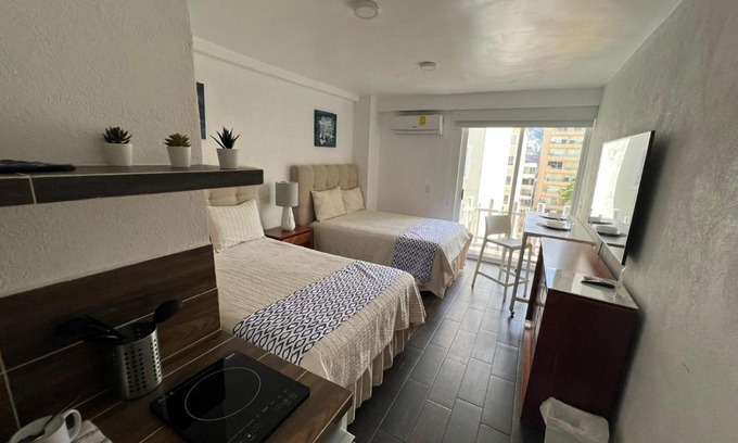 Costa Azul Apartment | Relax at SKY INN Acapulco with Pool Access & Great Reviews