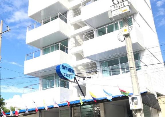 Tolu Hotel | Oceanfront Escape at Sky View Hotel Tolu with Pool Access