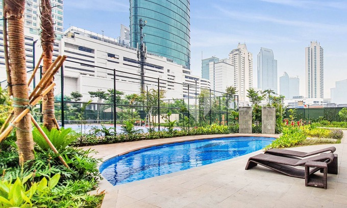 East Kuningan Apartment | Discover SKYE by Kozystay: Family-Friendly with Pool Access