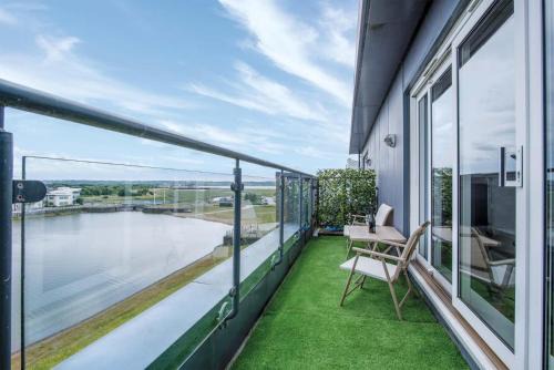 Llanelli Apartment | Inviting Skyline Duplex Penthouse with Family-Friendly Amenities