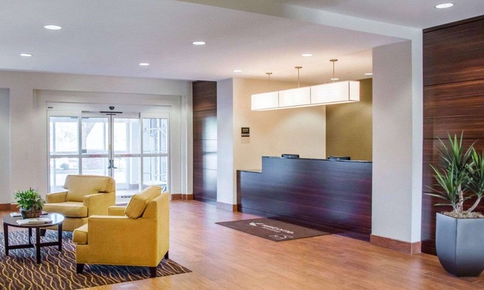 Parkersburg Hotel | Eco-Friendly Stay at Sleep Inn & Suites with Spa Amenities