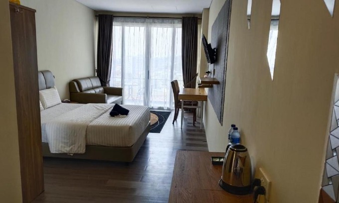Lubuk Baja Apartment | Relaxing Getaway at SleepRest @ NTC with Oceanfront Views