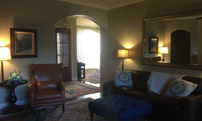 Oxford House | Perfect Getaway for 10 Near The Grove - Pet-Friendly Stay!