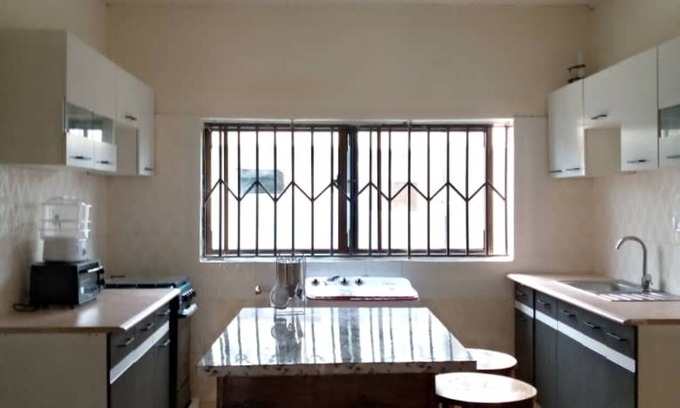 Kumasi Apartment | Inviting 2-Bed Apartment with Kitchen in Kumasi Ashanti
