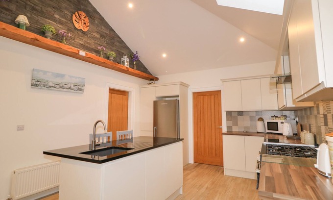 Downpatrick Cottage | Sliabh Amharc