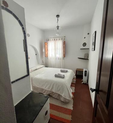 Bubion Apartment | Relax at Slow House: Oceanfront Escape with Pool Access