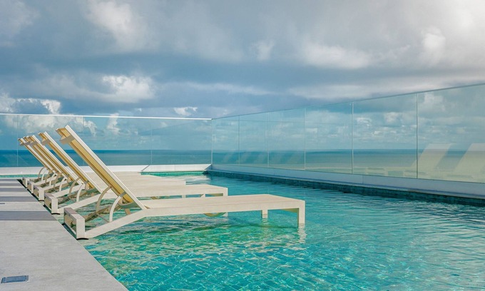 Stella Maris Apartment | Modern Apartment Steps from the Sea with Family Amenities